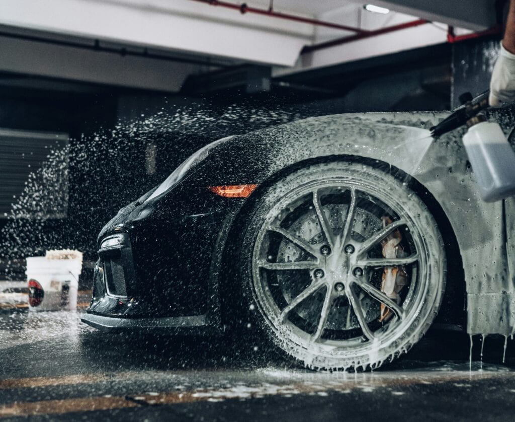 Car wash removing salt damage in Canadian winter