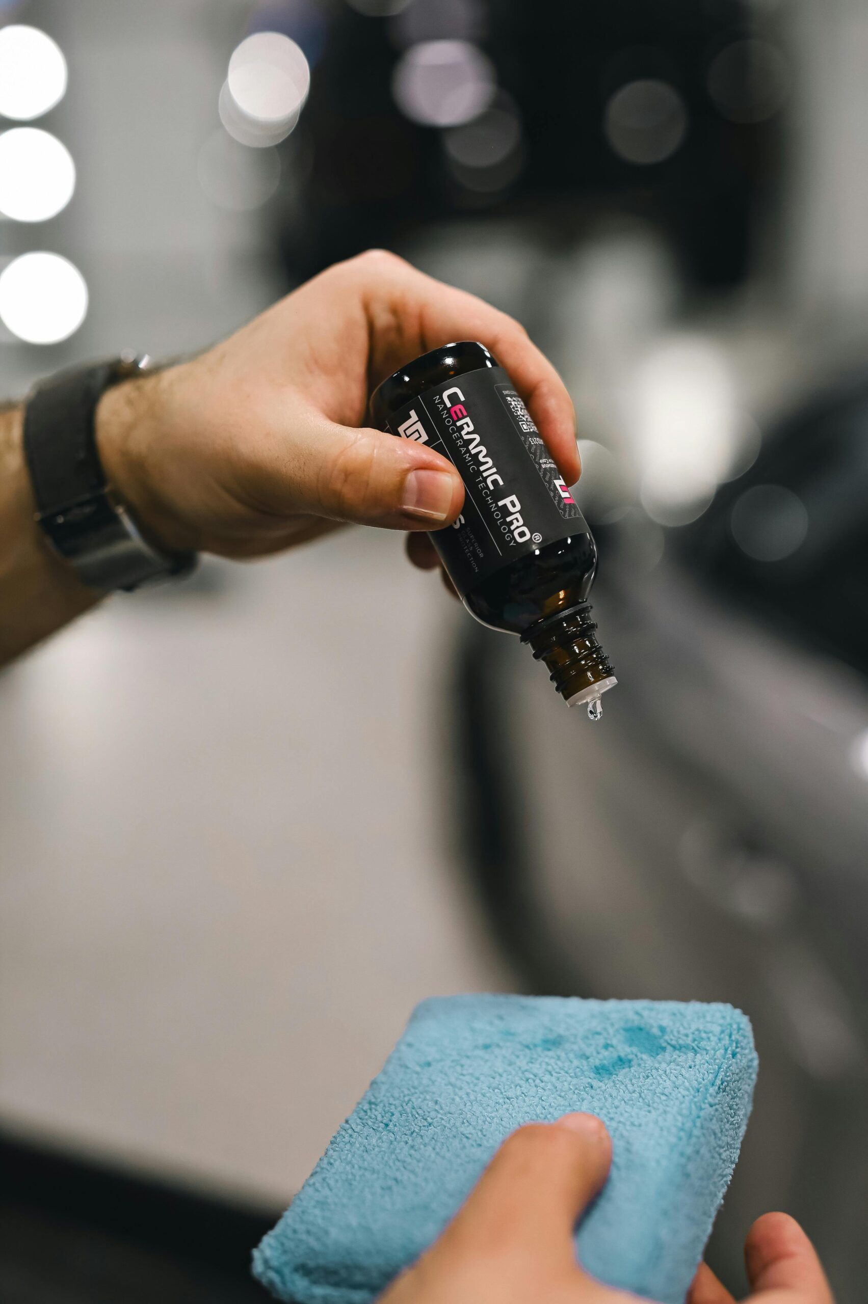 Detailer applying ceramic coating